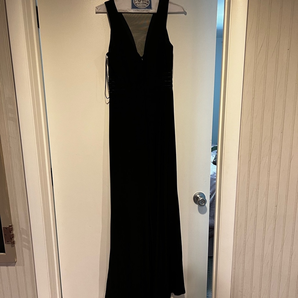 Black dress . With mesh front and side opening